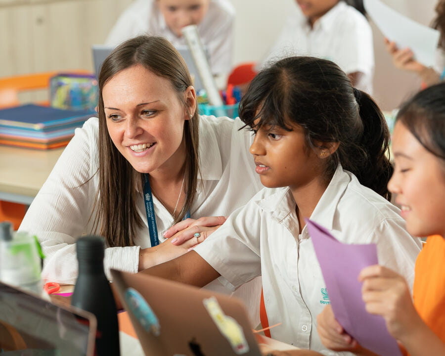 A teacher and a student in the classroom