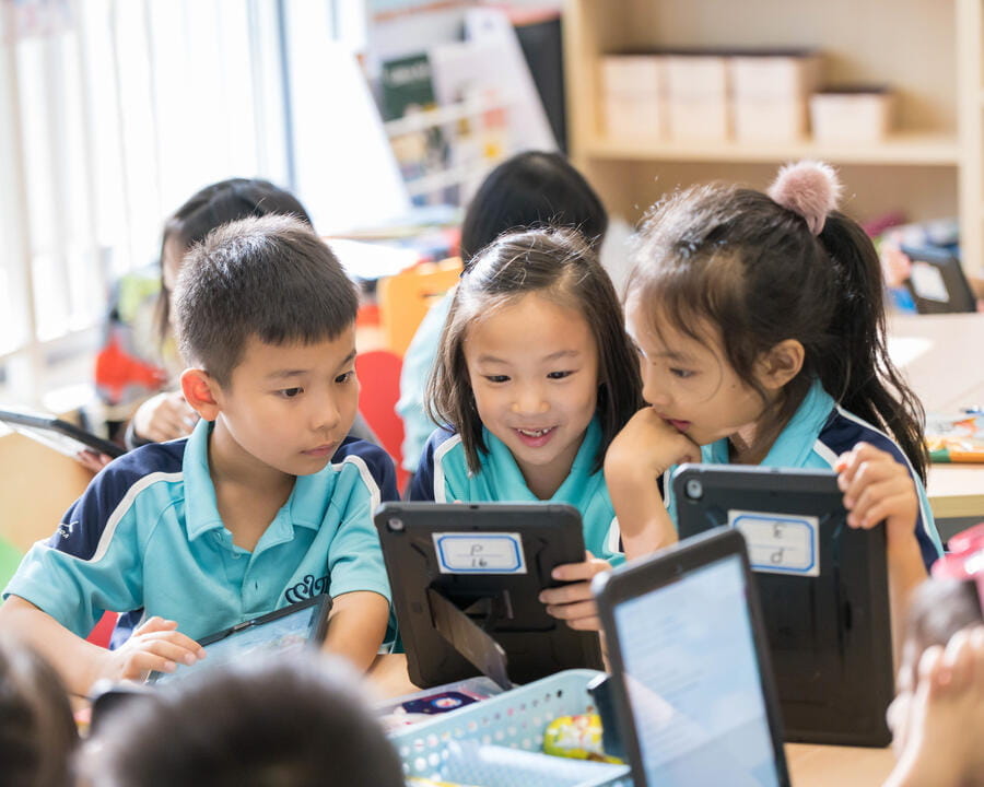 Students learning on Tablets