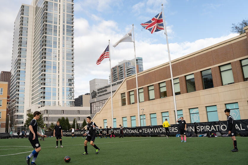 Students playing rugby on Astroturf
