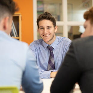 Photograph of Students having a discussion
