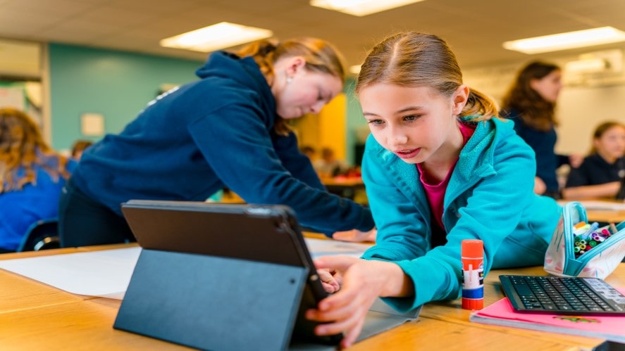 World Education Summit 2024: ‘Metacognition has the potential to transform education’, says Nord Anglia’s Dr Kate Erricker-World Education Summit 2024-Girl clicking button on Ipad