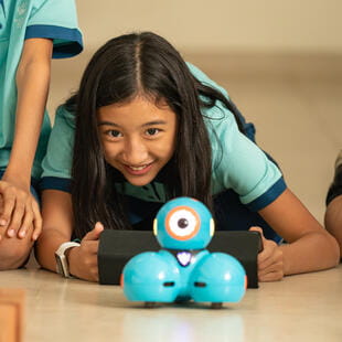 Yangon student operating robot - Nord Anglia Education