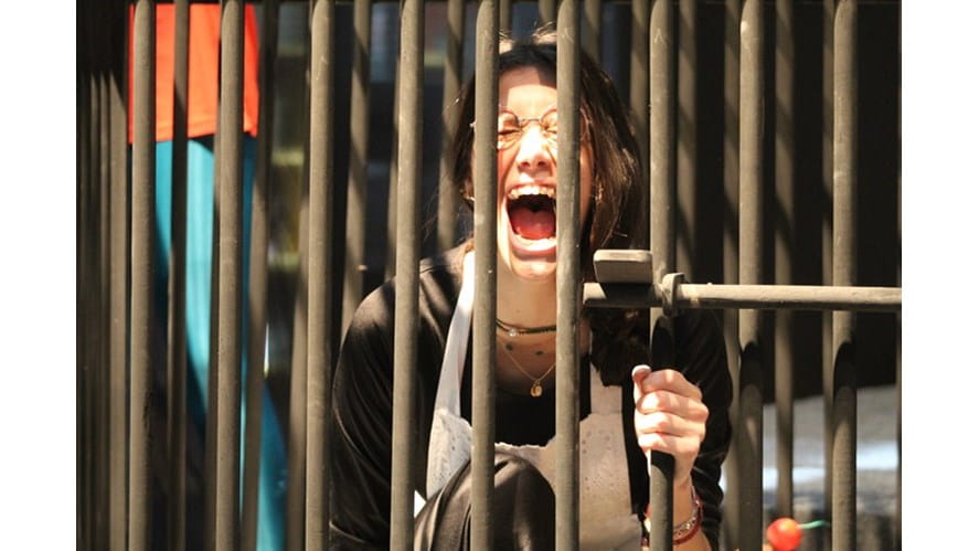 Witch screaming in a cage