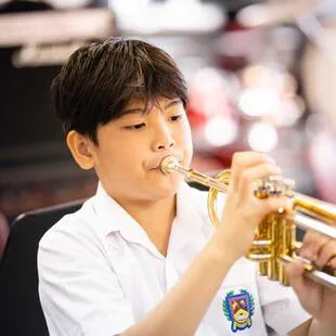 Young student learning piano with teacher - Nord Anglia Education