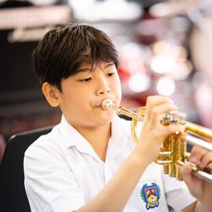 Young student learning piano with teacher - Nord Anglia Education
