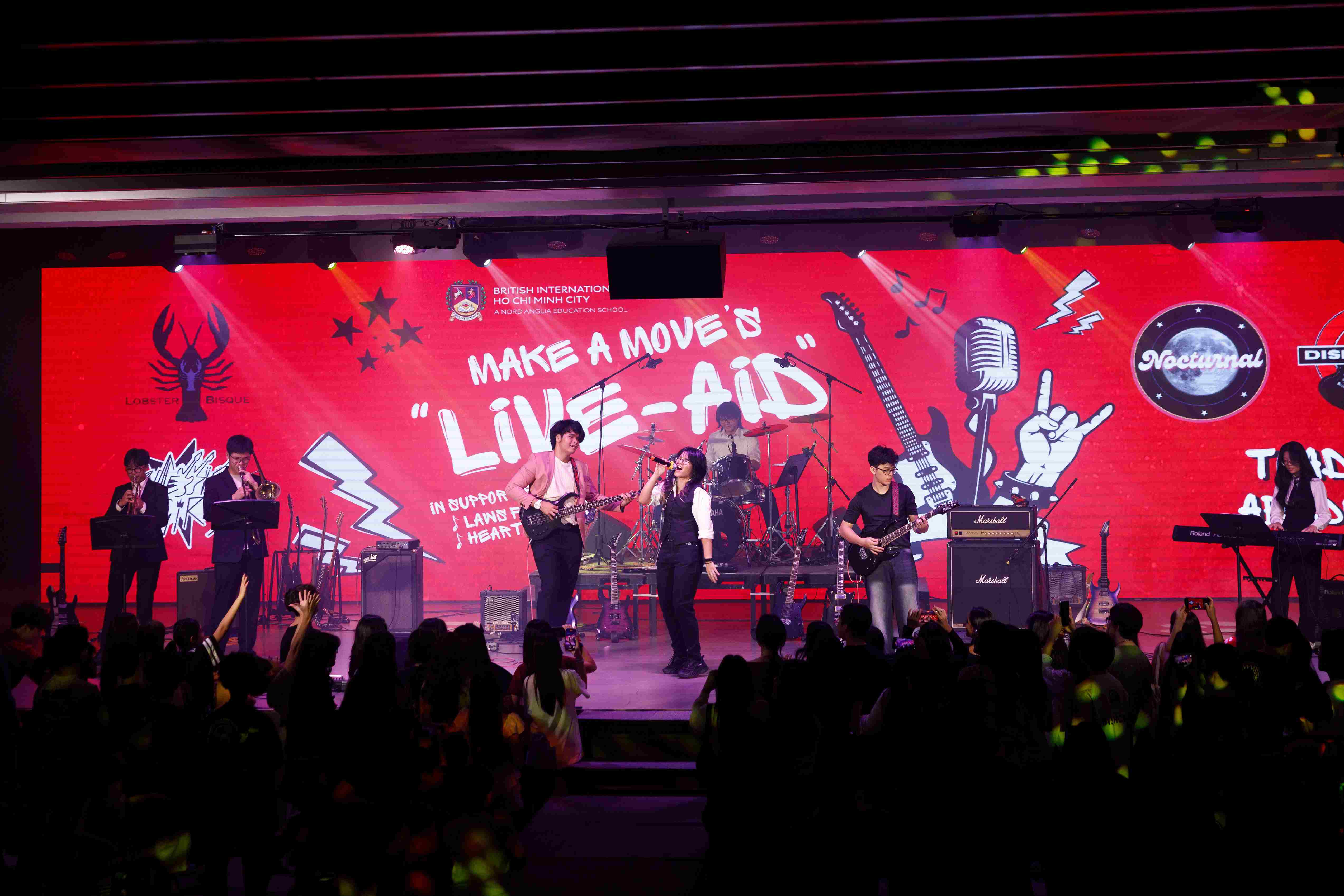 Student-led rock concert Live Aid supports Laws for Paws and Heartbeat Vietnam - Carousel For News Detail 1