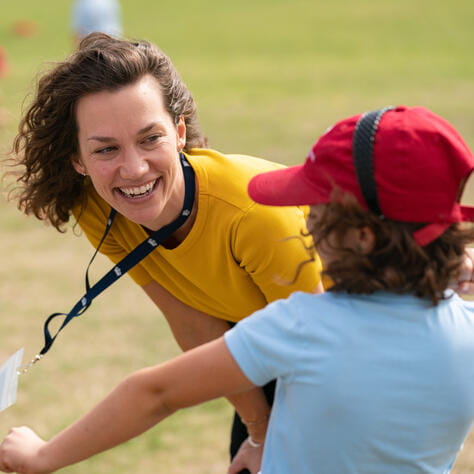 Teacher and student enjoying an International Primary Curriculum class 