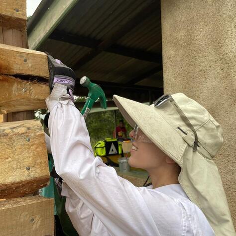 BISB Tanzania girl with hammer