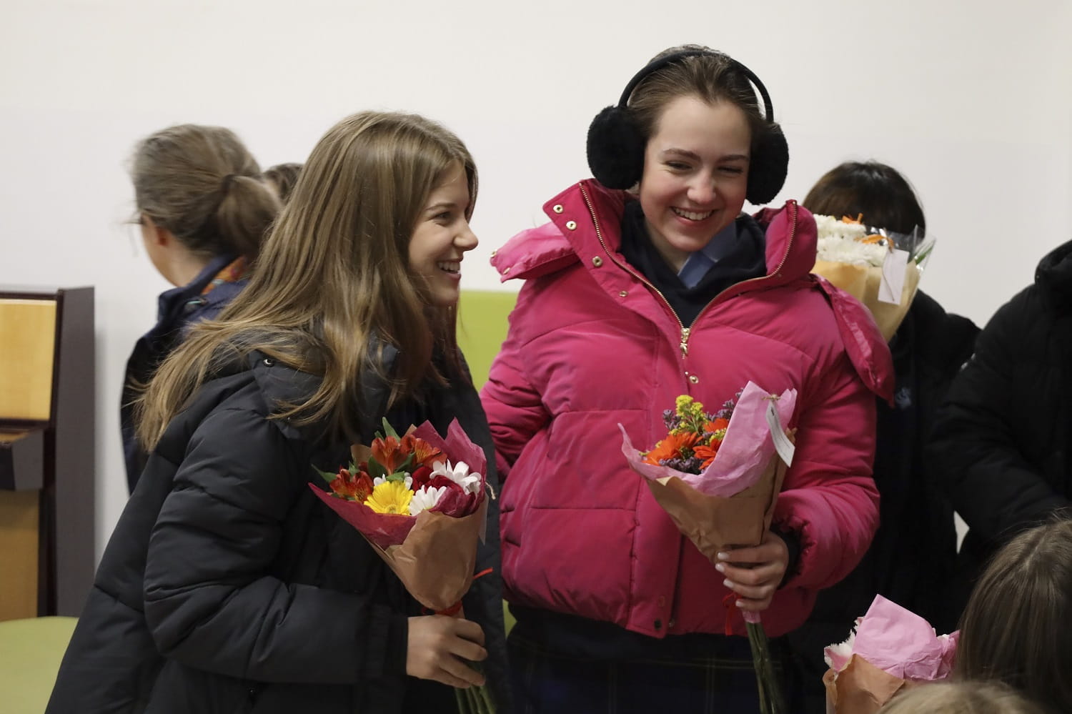 Students giving flowers