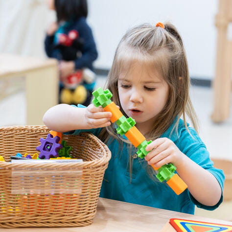 Child learning in Pre-nursery curriculum class
