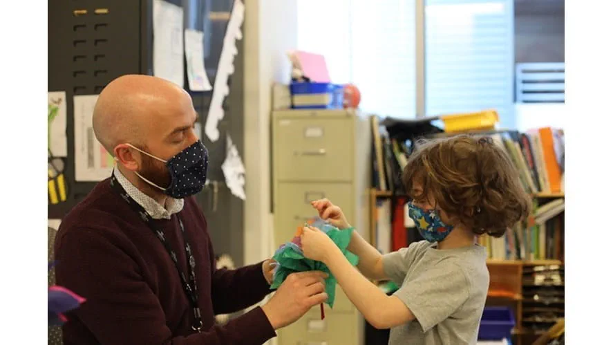 Tom with student