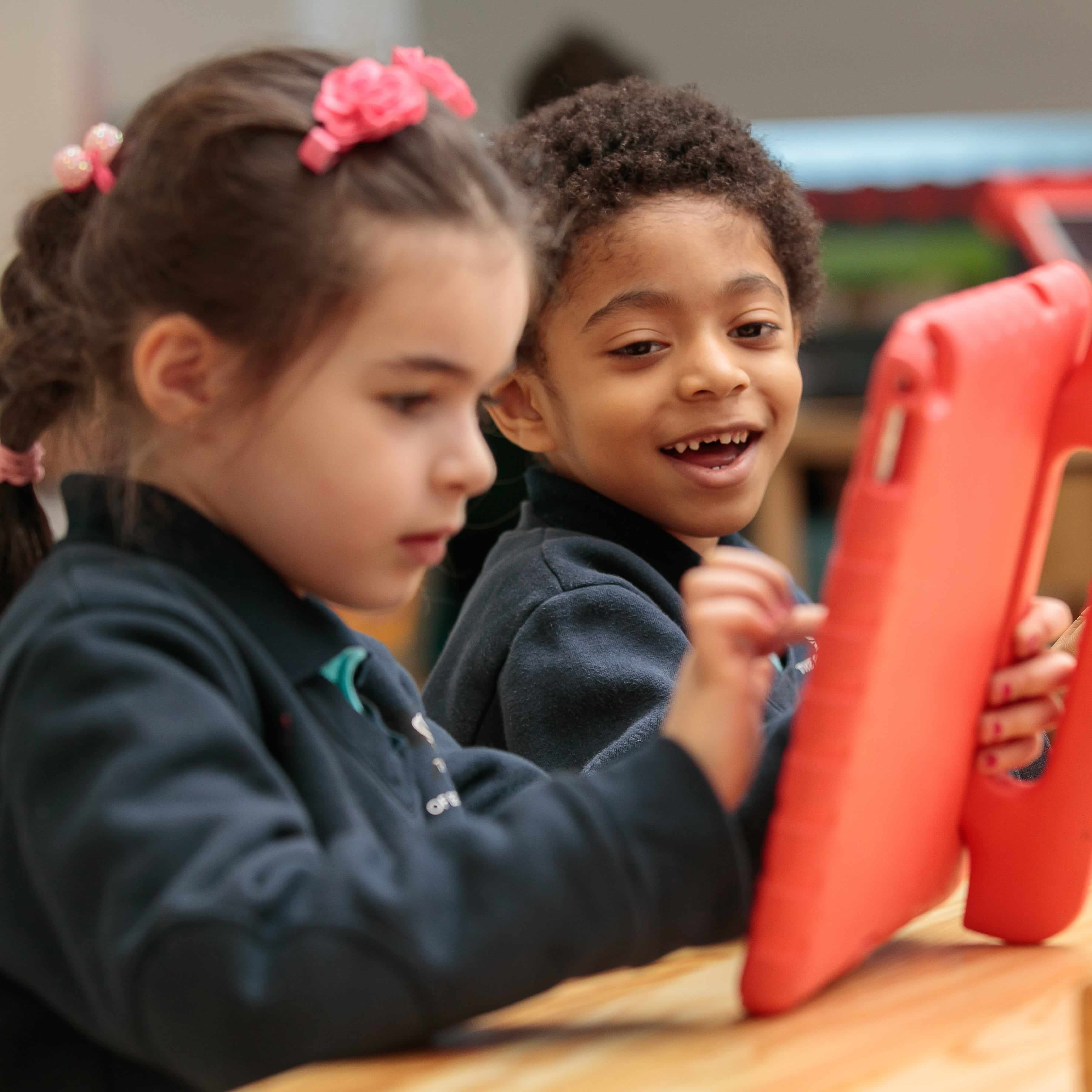 EY children using iPads