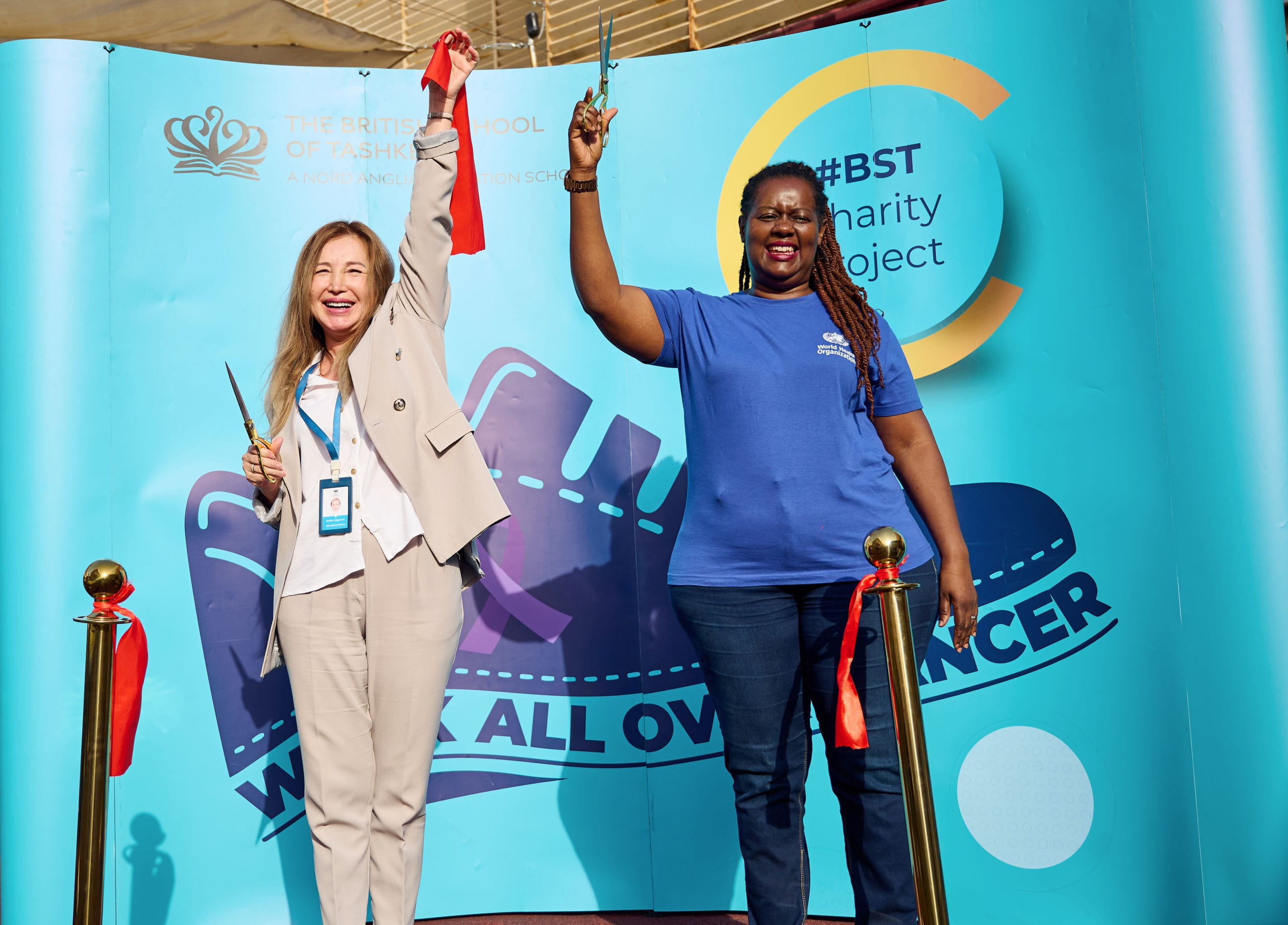 Guest speakers including a WHO representative, and a Tashkent International Clinic specialist addressing attendees at The British School of Tashkent.