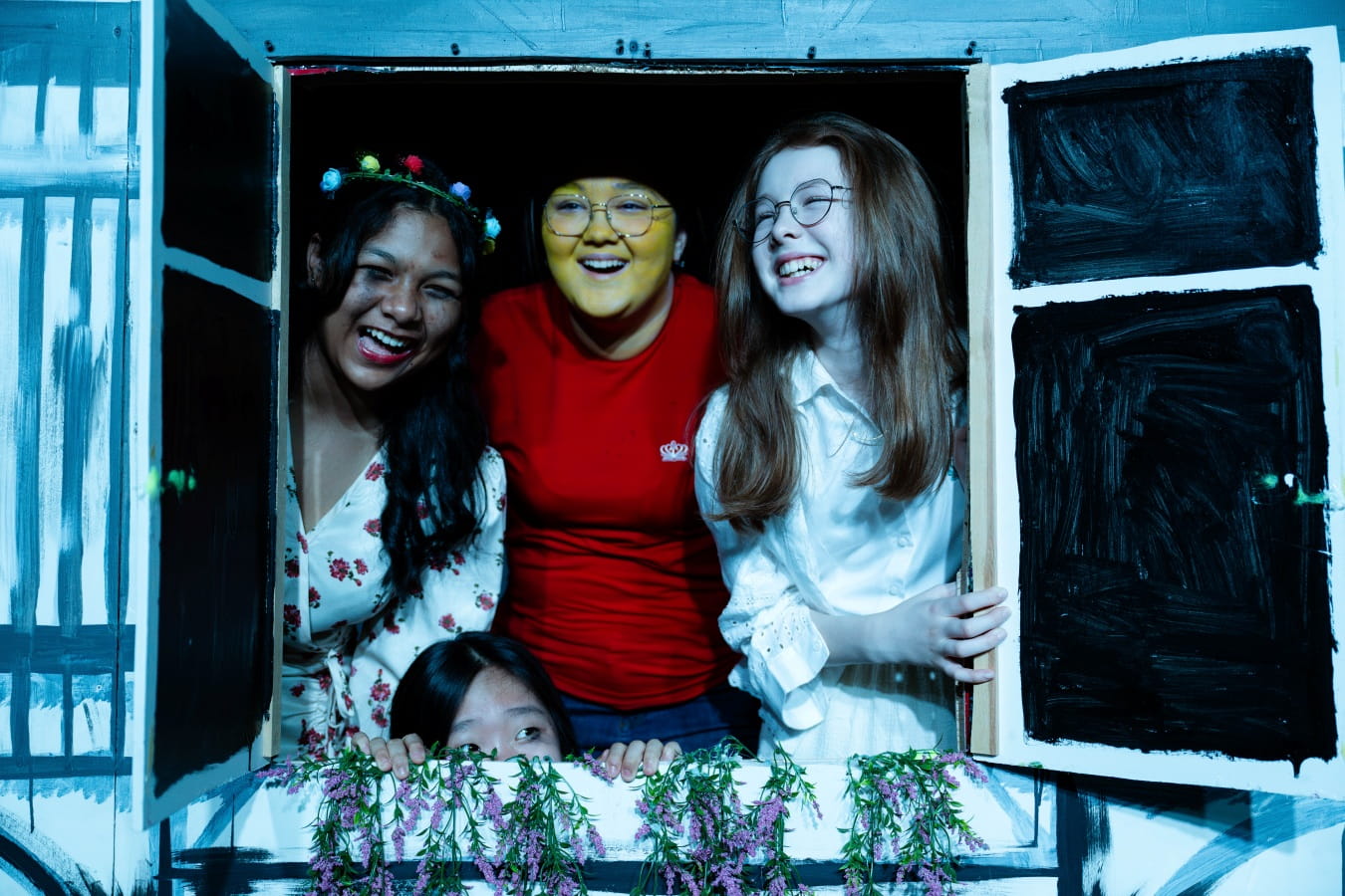 Students performing on stage during a BST music lesson inspired by the Juilliard collaboration.