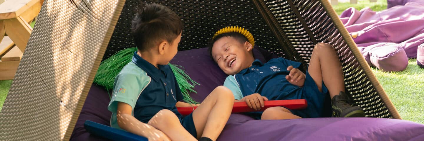 Two boys smiling together