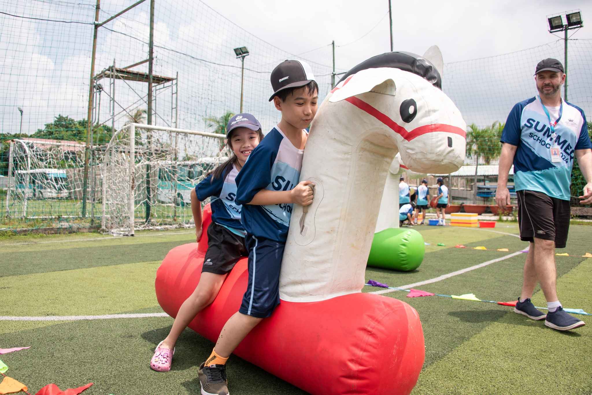 Summer School 2024 | Our students challenge their archery skills at the Archery Tag venue - Carousel For News Detail