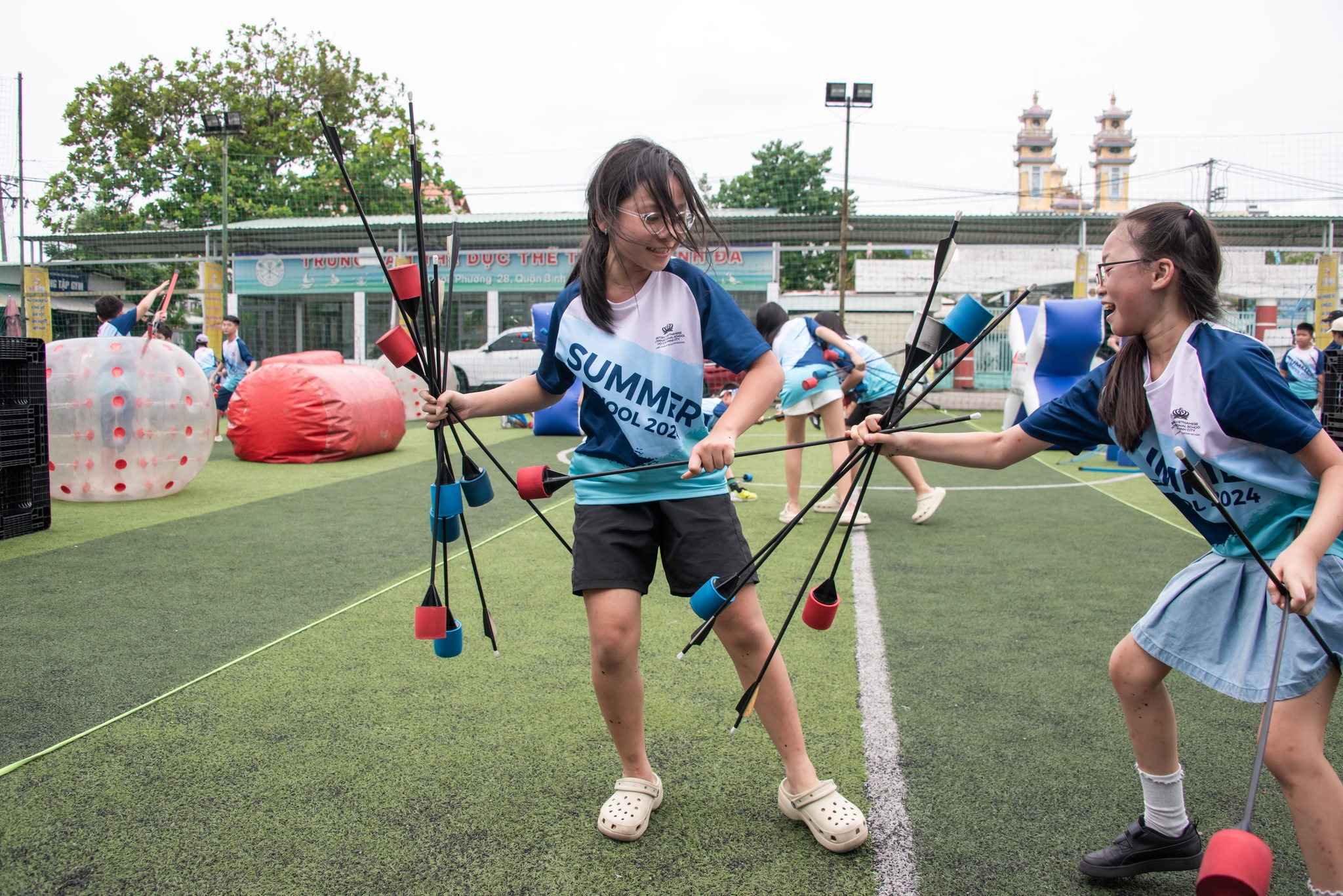 Summer School 2024 | Our students challenge their archery skills at the Archery Tag venue - Carousel For News Detail