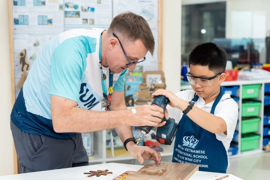 Students receiving personalised support during a design and technology lesson