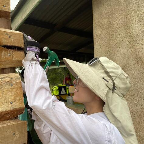 BISB Tanzania girl with hammer