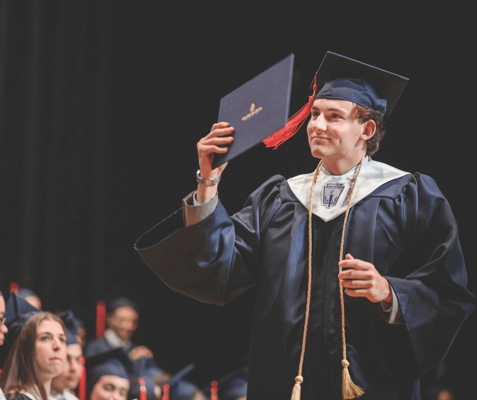 CDL student celebrating graduation on stage, proud of academic achievement and ready for top university success.