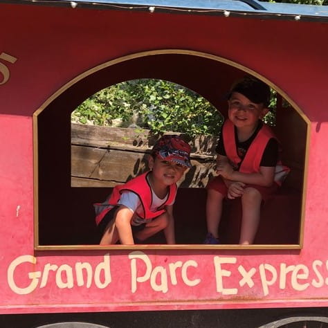 Two kids inside a train