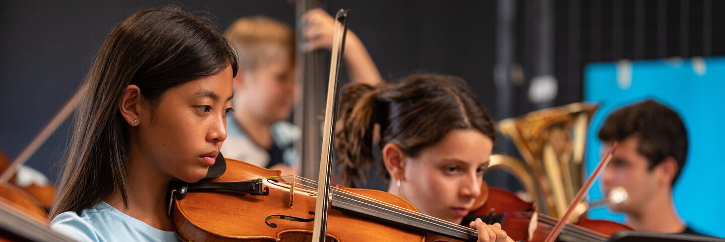 Girls playing violin