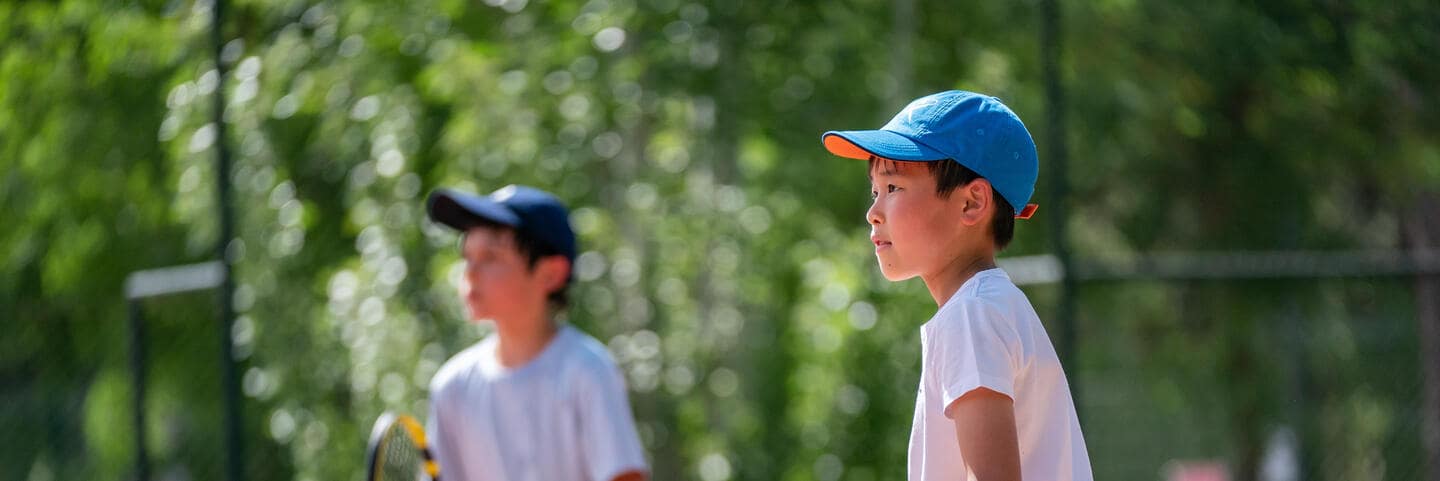 Boys playing tennis