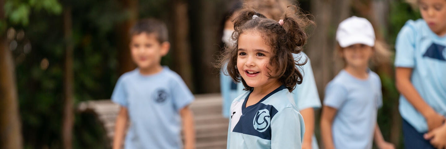 Girls smiling in playground