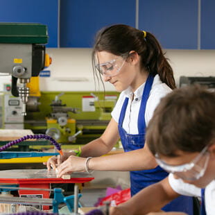 Yangon student operating robot - Nord Anglia Education