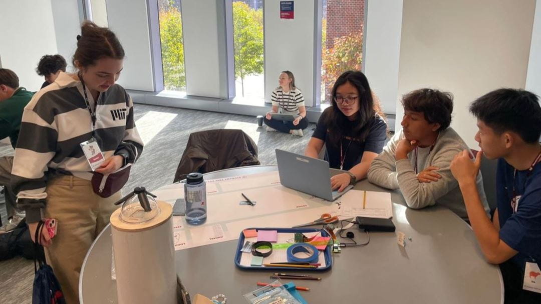 NAE delegates working together at the MIT Festival in Boston