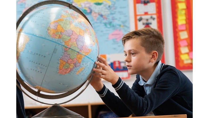 student with globe