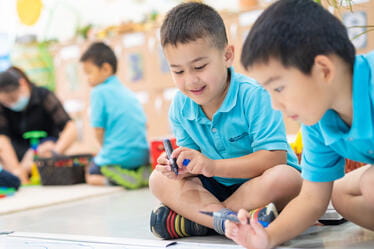 Boys in early years lesson NAIS Pudong