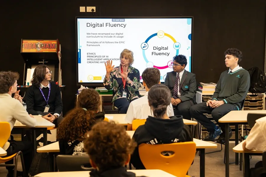 Professor Rose Luckin speaking with students during an AI and digital fluency panel discussion at Nord Anglia International School Dubai.