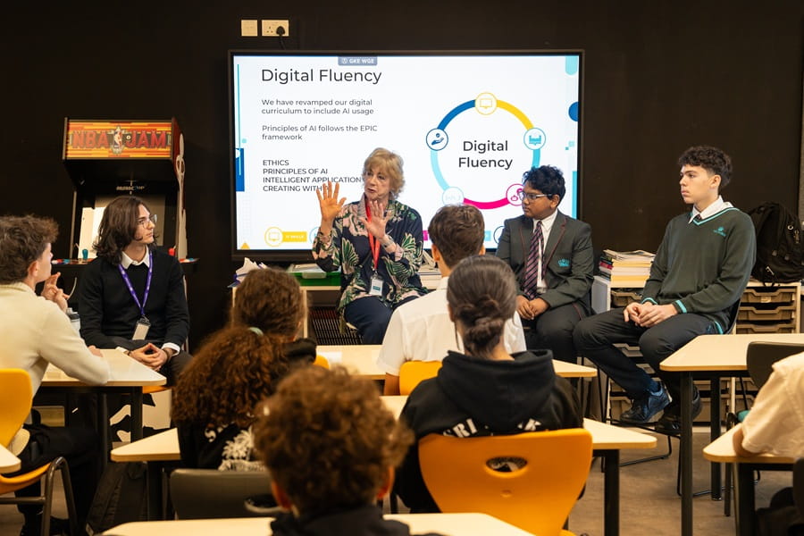 Professor Rose Luckin speaking with students during an AI and digital fluency panel discussion at Nord Anglia International School Dubai.