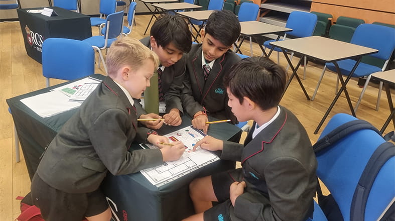 NAS Dubai Y5 Maths Team solving challenges