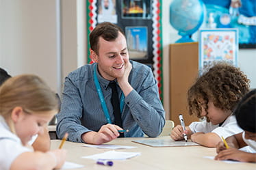 NAS Dubai ks2 students in classroom with teacher