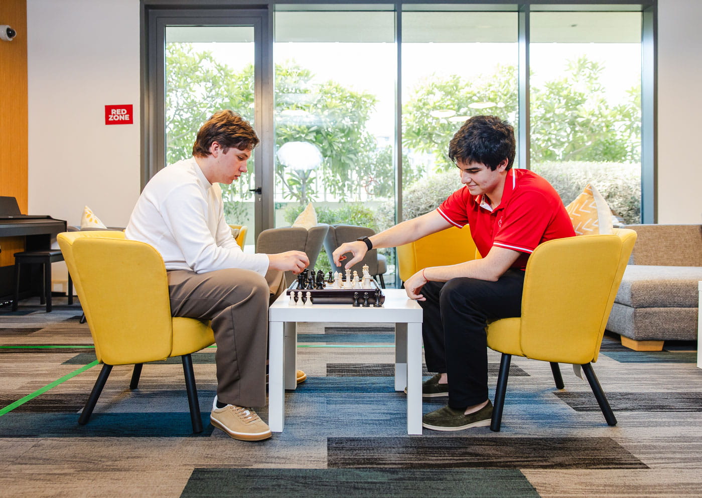 two sudents playing chess