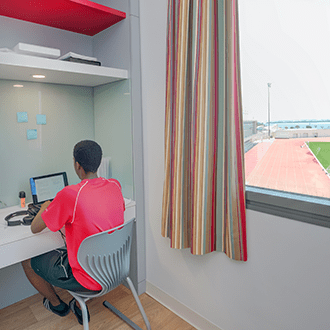 boarding-student-in-room