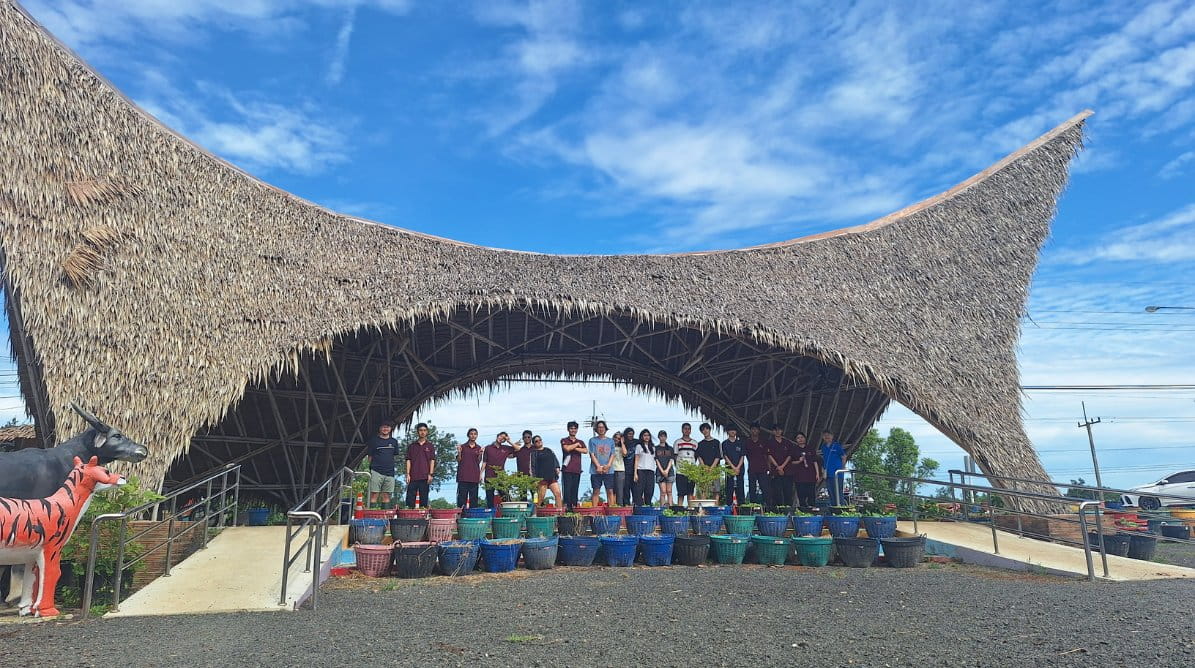 Students visit Mechai Pattana Bamboo School in northeast Thailand to learn about sustainable community development. - Mechai Pattana Bamboo School