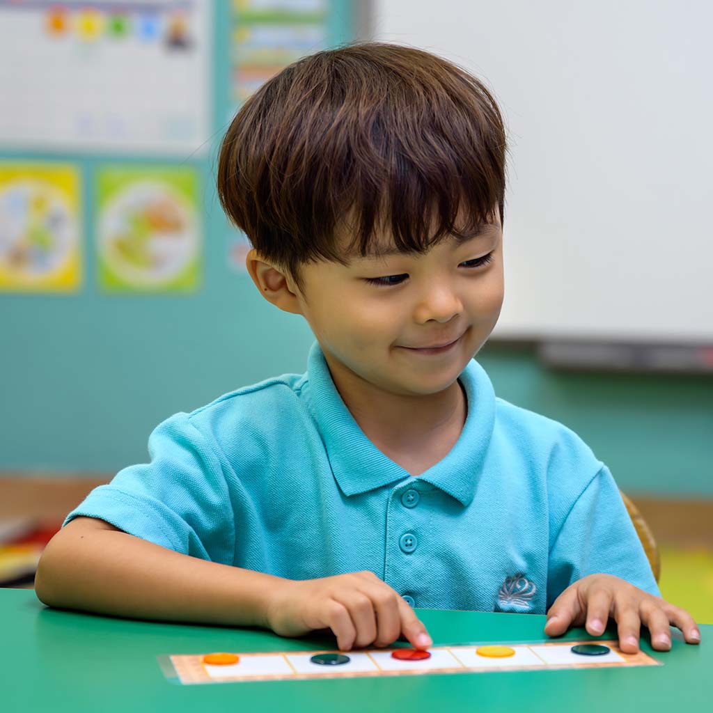 boy learning in a class