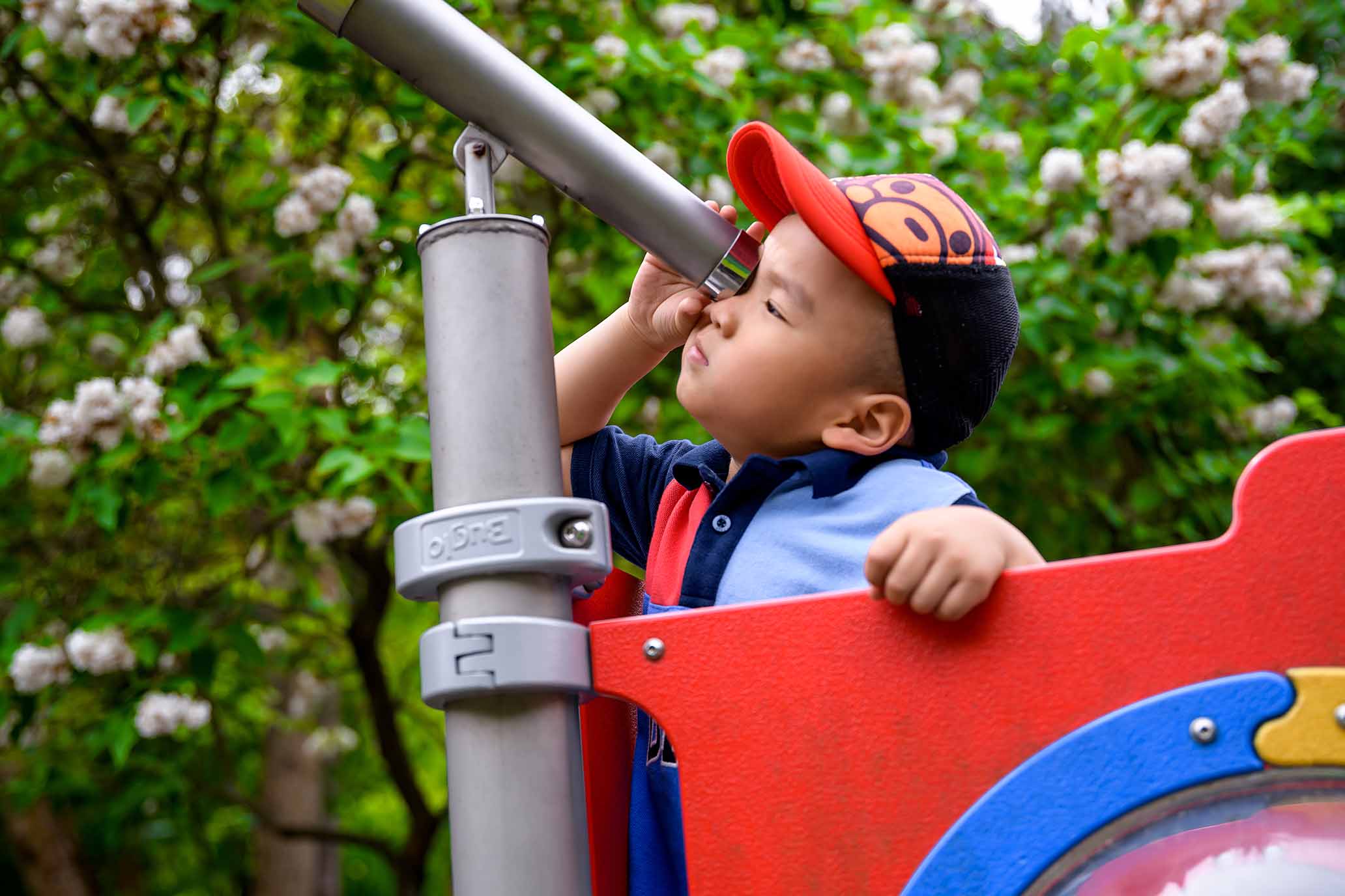 child with a spyglass