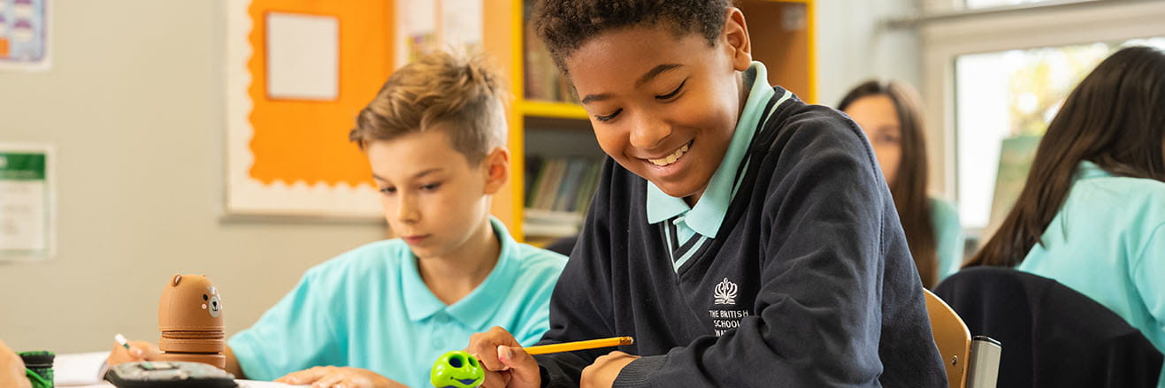 primary school students learning in class