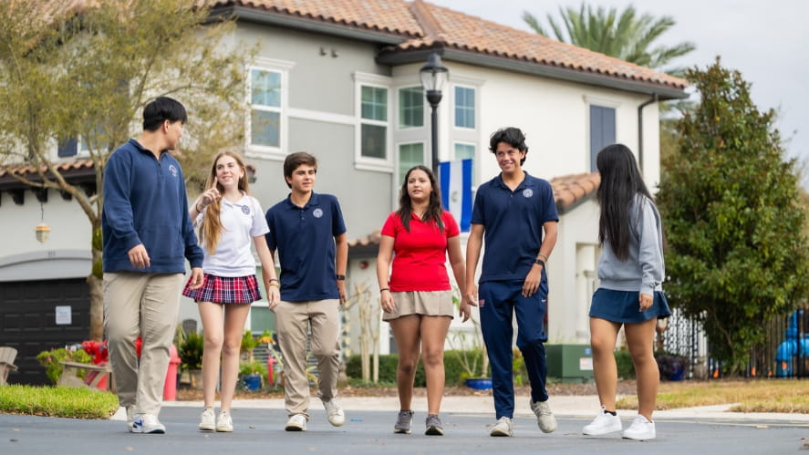 Windermere Preparatory School boarding students walking together through the residential life community in Orlando, Florida.