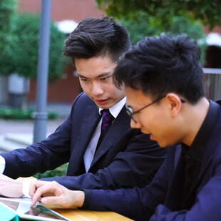 Students discussing their work